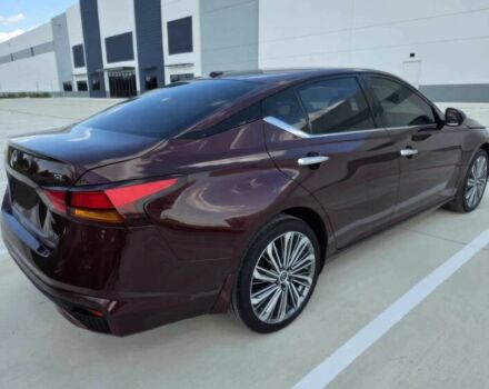 Красный Ниссан Альтима, объемом двигателя 2.5 л и пробегом 24 тыс. км за 10000 $, фото 4 на Automoto.ua