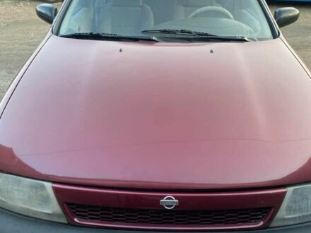 Красный Ниссан Альтима, объемом двигателя 2.4 л и пробегом 200 тыс. км за 1850 $, фото 1 на Automoto.ua