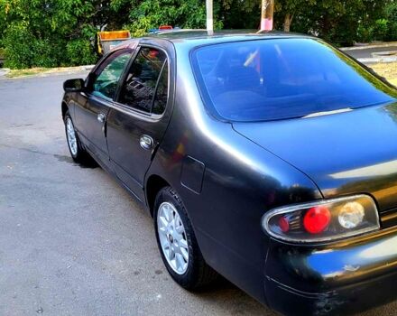 Сірий Ніссан Альтіма, об'ємом двигуна 2.4 л та пробігом 240 тис. км за 1500 $, фото 2 на Automoto.ua