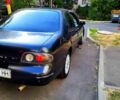 Сірий Ніссан Альтіма, об'ємом двигуна 2.4 л та пробігом 240 тис. км за 1500 $, фото 3 на Automoto.ua