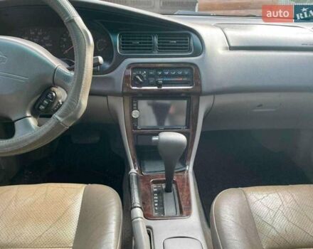 Серый Ниссан Альтима, объемом двигателя 2.4 л и пробегом 320 тыс. км за 2890 $, фото 3 на Automoto.ua