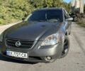 Серый Ниссан Альтима, объемом двигателя 2.5 л и пробегом 251 тыс. км за 3200 $, фото 1 на Automoto.ua