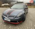 Серый Ниссан Альтима, объемом двигателя 2.49 л и пробегом 240 тыс. км за 4500 $, фото 1 на Automoto.ua