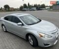 Сірий Ніссан Альтіма, об'ємом двигуна 2.5 л та пробігом 285 тис. км за 8900 $, фото 1 на Automoto.ua