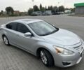Сірий Ніссан Альтіма, об'ємом двигуна 2.5 л та пробігом 285 тис. км за 8900 $, фото 1 на Automoto.ua