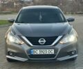 Серый Ниссан Альтима, объемом двигателя 2.5 л и пробегом 135 тыс. км за 10000 $, фото 1 на Automoto.ua