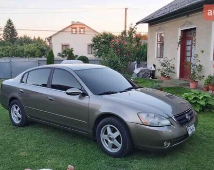 Сірий Ніссан Альтіма, об'ємом двигуна 2.49 л та пробігом 286 тис. км за 3300 $, фото 1 на Automoto.ua