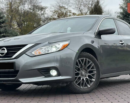 Серый Ниссан Альтима, объемом двигателя 2.49 л и пробегом 256 тыс. км за 9999 $, фото 1 на Automoto.ua