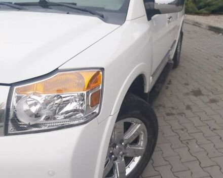 Белый Ниссан Армада, объемом двигателя 5.55 л и пробегом 300 тыс. км за 15500 $, фото 2 на Automoto.ua