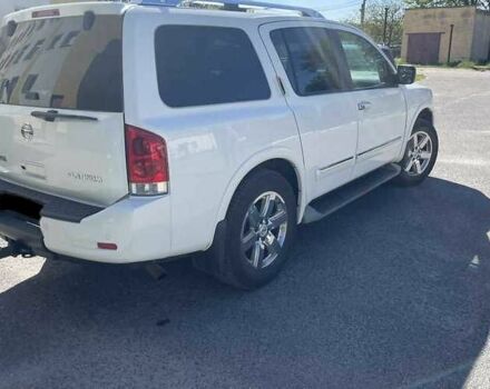 Белый Ниссан Армада, объемом двигателя 5.55 л и пробегом 245 тыс. км за 14500 $, фото 2 на Automoto.ua