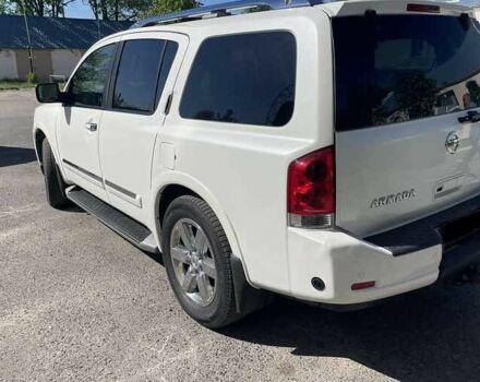 Белый Ниссан Армада, объемом двигателя 5.55 л и пробегом 245 тыс. км за 14500 $, фото 1 на Automoto.ua