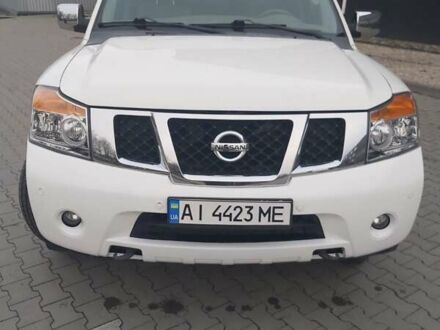 Білий Ніссан Armada, об'ємом двигуна 5.55 л та пробігом 300 тис. км за 15500 $, фото 1 на Automoto.ua