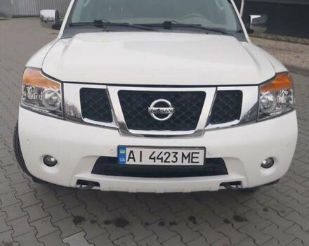 Білий Ніссан Armada, об'ємом двигуна 5.55 л та пробігом 300 тис. км за 15500 $, фото 1 на Automoto.ua
