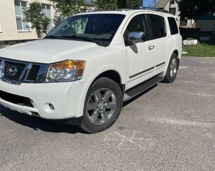 Белый Ниссан Армада, объемом двигателя 5.55 л и пробегом 245 тыс. км за 14500 $, фото 1 на Automoto.ua