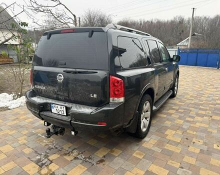 Черный Ниссан Армада, объемом двигателя 5.6 л и пробегом 150 тыс. км за 12800 $, фото 2 на Automoto.ua