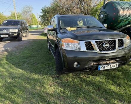 Черный Ниссан Армада, объемом двигателя 5.6 л и пробегом 150 тыс. км за 12800 $, фото 1 на Automoto.ua