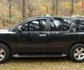 Черный Ниссан Армада, объемом двигателя 5.6 л и пробегом 240 тыс. км за 9200 $, фото 4 на Automoto.ua