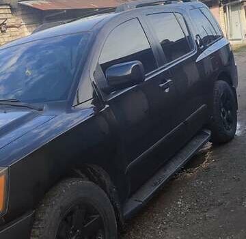 Черный Ниссан Армада, объемом двигателя 5.6 л и пробегом 300 тыс. км за 8500 $, фото 27 на Automoto.ua