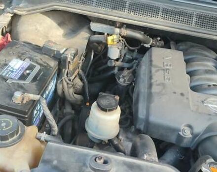 Черный Ниссан Армада, объемом двигателя 5.6 л и пробегом 300 тыс. км за 8500 $, фото 4 на Automoto.ua