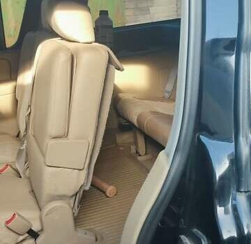 Черный Ниссан Армада, объемом двигателя 5.6 л и пробегом 300 тыс. км за 8500 $, фото 13 на Automoto.ua