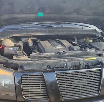 Черный Ниссан Армада, объемом двигателя 5.6 л и пробегом 300 тыс. км за 8500 $, фото 6 на Automoto.ua