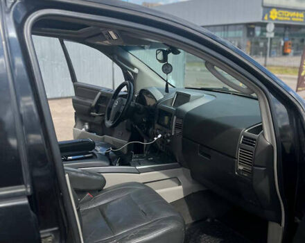 Чорний Ніссан Armada, об'ємом двигуна 5.6 л та пробігом 300 тис. км за 5100 $, фото 4 на Automoto.ua