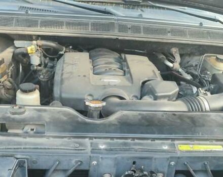 Черный Ниссан Армада, объемом двигателя 5.6 л и пробегом 300 тыс. км за 8500 $, фото 2 на Automoto.ua