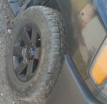 Черный Ниссан Армада, объемом двигателя 5.6 л и пробегом 300 тыс. км за 8500 $, фото 9 на Automoto.ua