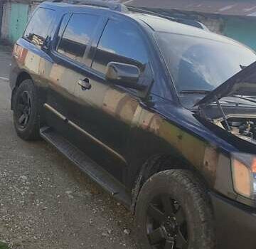 Черный Ниссан Армада, объемом двигателя 5.6 л и пробегом 300 тыс. км за 8500 $, фото 7 на Automoto.ua