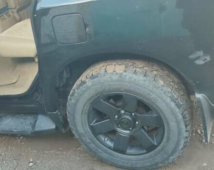 Черный Ниссан Армада, объемом двигателя 5.6 л и пробегом 300 тыс. км за 8500 $, фото 18 на Automoto.ua