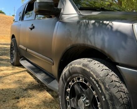 Черный Ниссан Армада, объемом двигателя 5.6 л и пробегом 264 тыс. км за 10500 $, фото 13 на Automoto.ua