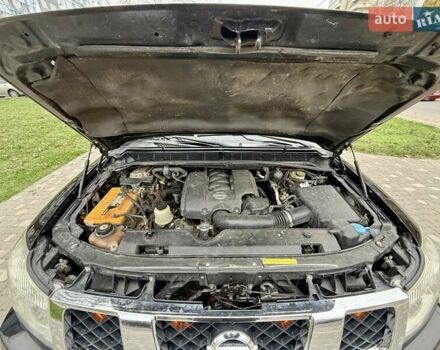 Черный Ниссан Армада, объемом двигателя 5.6 л и пробегом 267 тыс. км за 10999 $, фото 80 на Automoto.ua