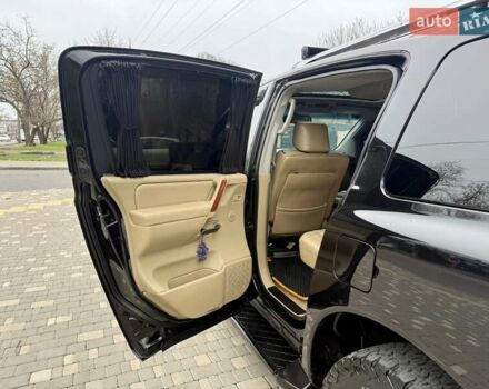 Черный Ниссан Армада, объемом двигателя 5.6 л и пробегом 267 тыс. км за 10999 $, фото 60 на Automoto.ua
