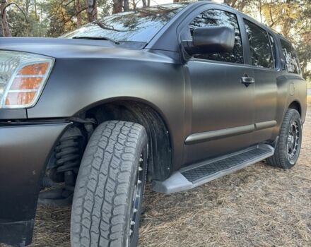 Черный Ниссан Армада, объемом двигателя 5.6 л и пробегом 264 тыс. км за 10500 $, фото 2 на Automoto.ua