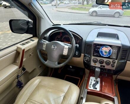 Черный Ниссан Армада, объемом двигателя 5.6 л и пробегом 267 тыс. км за 10999 $, фото 78 на Automoto.ua