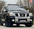 Черный Ниссан Армада, объемом двигателя 5.6 л и пробегом 267 тыс. км за 10999 $, фото 1 на Automoto.ua