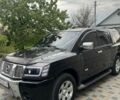 Черный Ниссан Армада, объемом двигателя 0 л и пробегом 244 тыс. км за 11000 $, фото 1 на Automoto.ua