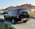 Чорний Ніссан Armada, об'ємом двигуна 5.6 л та пробігом 230 тис. км за 12500 $, фото 1 на Automoto.ua