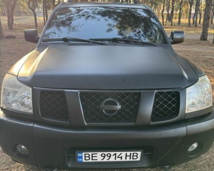 Черный Ниссан Армада, объемом двигателя 5.6 л и пробегом 264 тыс. км за 10500 $, фото 1 на Automoto.ua