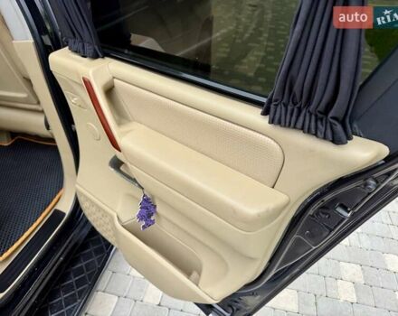 Черный Ниссан Армада, объемом двигателя 5.6 л и пробегом 267 тыс. км за 10999 $, фото 69 на Automoto.ua