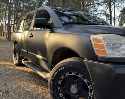 Черный Ниссан Армада, объемом двигателя 5.6 л и пробегом 264 тыс. км за 10500 $, фото 10 на Automoto.ua