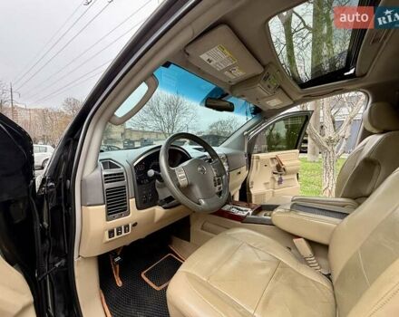 Черный Ниссан Армада, объемом двигателя 5.6 л и пробегом 267 тыс. км за 10999 $, фото 39 на Automoto.ua