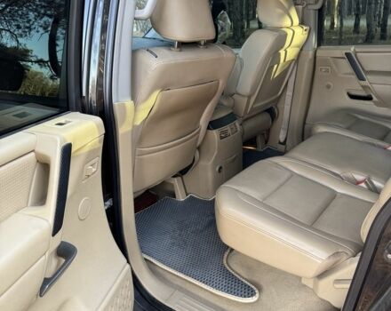 Черный Ниссан Армада, объемом двигателя 5.6 л и пробегом 264 тыс. км за 10500 $, фото 3 на Automoto.ua