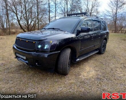 Черный Ниссан Армада, объемом двигателя 5.6 л и пробегом 255 тыс. км за 8000 $, фото 1 на Automoto.ua