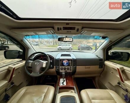 Черный Ниссан Армада, объемом двигателя 5.6 л и пробегом 267 тыс. км за 10999 $, фото 74 на Automoto.ua