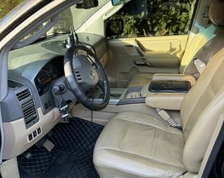 Чорний Ніссан Armada, об'ємом двигуна 5.6 л та пробігом 230 тис. км за 12500 $, фото 7 на Automoto.ua