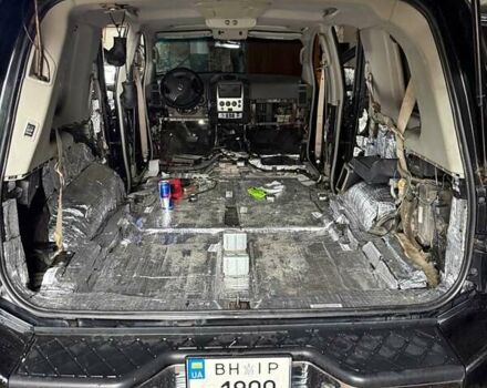 Черный Ниссан Армада, объемом двигателя 5.6 л и пробегом 267 тыс. км за 10999 $, фото 85 на Automoto.ua