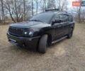 Черный Ниссан Армада, объемом двигателя 5.6 л и пробегом 255 тыс. км за 8000 $, фото 1 на Automoto.ua