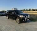 Черный Ниссан Армада, объемом двигателя 5.6 л и пробегом 230 тыс. км за 12500 $, фото 1 на Automoto.ua