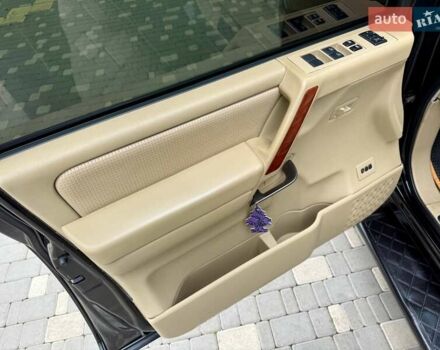 Черный Ниссан Армада, объемом двигателя 5.6 л и пробегом 267 тыс. км за 10999 $, фото 31 на Automoto.ua